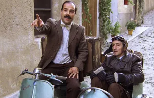 Padre e hijo en un sidecar