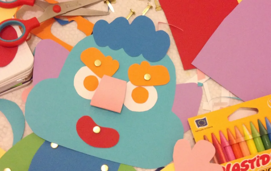 Recortes de cartulina que forman un monstruo