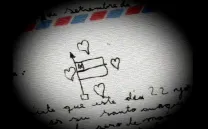 DIBUJO EN UNA CARTA CON CORAZONES