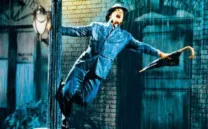 CANTANDO BAJO LA LLUVIA