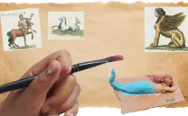 Mano pequeña con un pincel